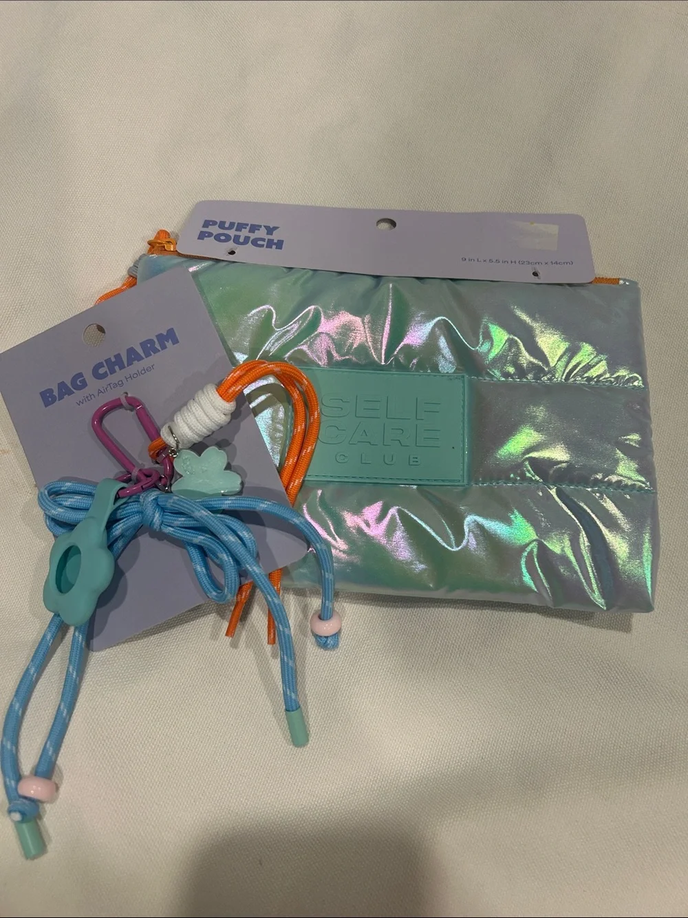 Target Iridescent Puffy Pouch with Blue and Orange Charm